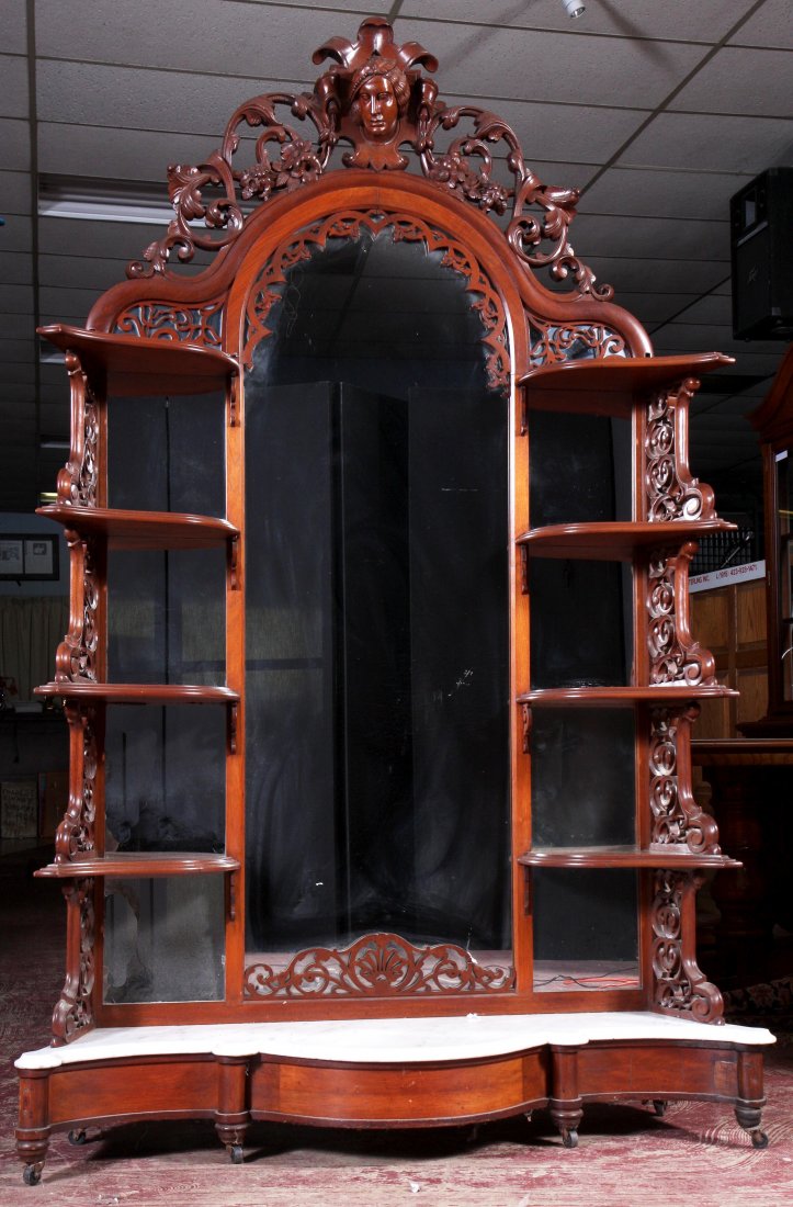 Victorian Walnut Étagère, Ca. 1865, white marble cookie: Victorian Walnut Étagère, Ca. 1865, white marble cookie corner slab, fine but replaced mirror, pierced carved top and sides, 40 year old finish, marble slab has 2 pieces approximately 1” x 2” mi