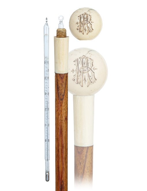 49. Ivory Physicians System Cane-European, 19thCentury-: 49. Ivory Physicians System Cane-European, 19thCentury-Straight ivory handle with ball and stem on a real rosewood shaft with a horn ferrule. The ball unscrews to reveal an 8 ½”tall mercury-in-glas