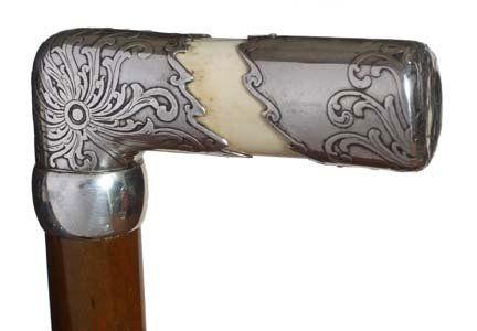 91. Tiffany Ivory and Silver Cane-Ca. 1890-A sterling o: 91. Tiffany Ivory and Silver Cane-Ca. 1890-A sterling overlay on fine grained ivory with Nouveau decoration, collar is signed “Tiffany & Co. Maker’s Sterling”, highly finished twig spur shaft an
