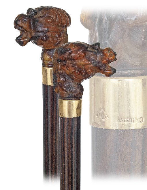 113. Tortoiseshell Camel Cane-Birmingham 1875-Figural t: 113. Tortoiseshell Camel Cane-Birmingham 1875-Figural tortoiseshell camel head handle, 9 karat yellow gold collar, polished makassar ebony shaft and a horn ferrule. -H. 2” x 1 ¾”, O.L. 36 ½”
