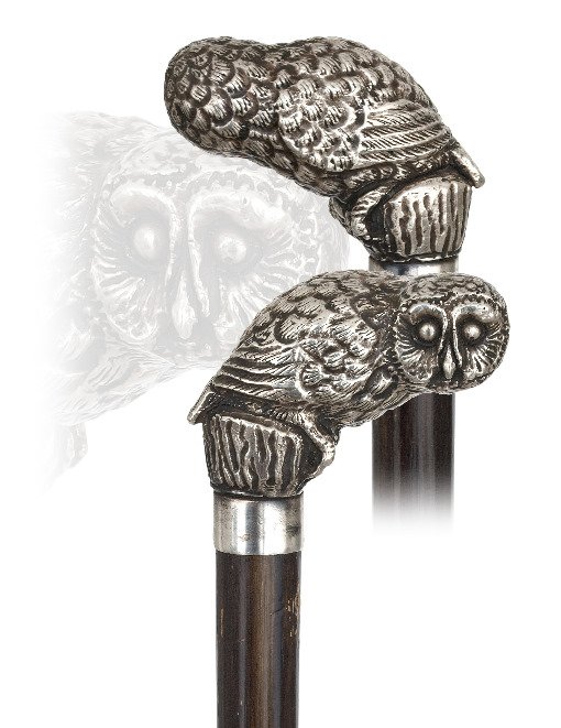 147. Silver Owl Cane-Ca. 1880-Well modeled silver noctu: 147. Silver Owl Cane-Ca. 1880-Well modeled silver nocturnal bird with the trademark large eyes and a fine feather coat, dark stained fruitwood shaft and a metal ferrule. -H. 3” x 2 ½”, O.L. 36”