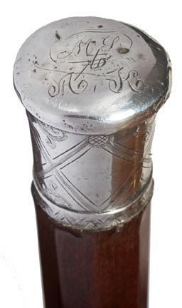 176. Sterling Dress Cane-Early 19th Century-A massive c: 176. Sterling Dress Cane-Early 19th Century-A massive coin silver handle with hand engraving and cross hatching, 1 ¼” octagonal exotic wood shaft with a small brass ferrule-H. 1 ½” x 1 ¾”, O.