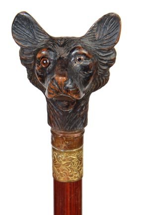 73. Dog Glove Holder Cane-Early 20th Century-A carved B: 73. Dog Glove Holder Cane-Early 20th Century-A carved Black Forest Glove Holder Dog with two color glass eyes, push button drop lower jaw, copper and gold-filled collar, exotic wood shaft and a horn f