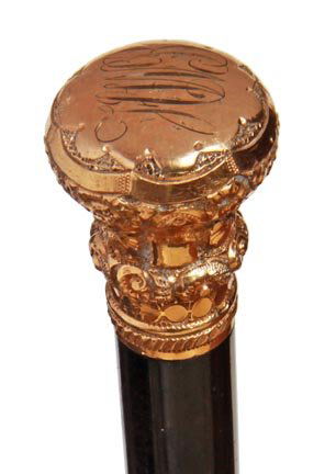 87. Gold-Filled Dress Cane-Ca. 1900-A near mint diminut: 87. Gold-Filled Dress Cane-Ca. 1900-A near mint diminutive handle, ebony shaft and a metal ferrule-H. 1 ¼” x 1 ½”, O.L. 36”-