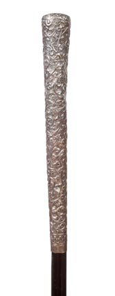 122. Sterling Dress Cane-Ca. 1910-A large ornate sterli: 122. Sterling Dress Cane-Ca. 1910-A large ornate sterling handle, ebony shaft and a metal ferrule-H. 1 ¼” x 9”, O.L. 36 ½”-