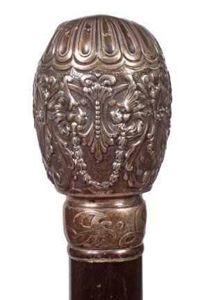124. Aesthetic Sterling Dress Cane-Ca. 1875-A signed st: 124. Aesthetic Sterling Dress Cane-Ca. 1875-A signed sterling handle with various griffins, sterling collar, ebony shaft and a metal ferrule-H. 1 3/8” x 2 ½”, O.L. 36 ½”-