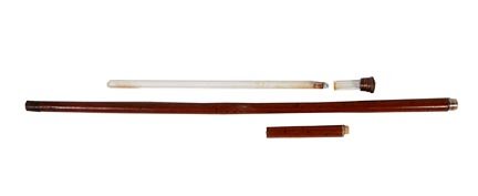 139. Tippler’s Stick-Ca. 1930-A container cane which ho: 139. Tippler’s Stick-Ca. 1930-A container cane which holds a shot glass and a glass tube with a cork which are both in fine condition, copper handle and collar, hardwood shaft and a metal ferrule-O.