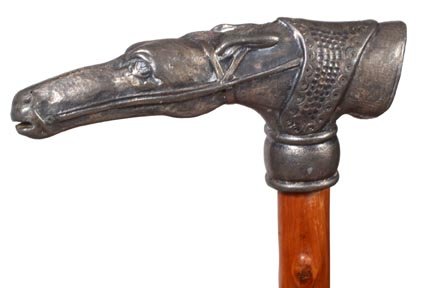 142. Pewter Race Horse Cane-Ca. 1900-A cast pewter race: 142. Pewter Race Horse Cane-Ca. 1900-A cast pewter race horse with saddle atop and a hoof end cap, twigspur shaft and a metal ferrule-H. 5 ½” x 2 ¼”, O.L. 36”-