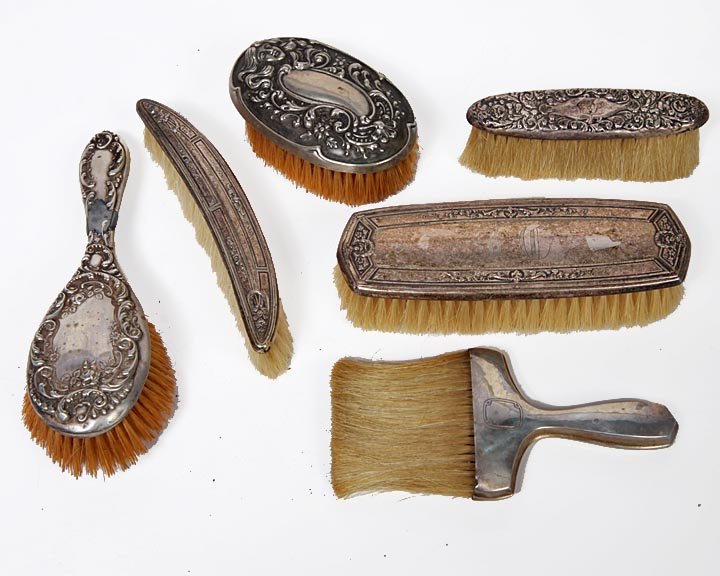 Lot of sterling brushes etc.