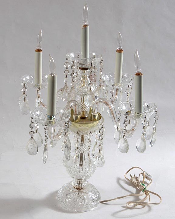 A pair of lighted candelabras in fine condition mid 20t
