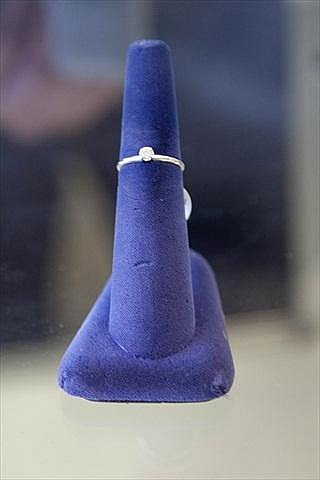 Diamond solitaire , white gold: 14kt white gold, one third carat. Very nice stone