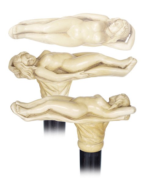 72. Venus Ivory Dress Cane-Circa 1890-A substantial T-s: 72. Venus Ivory Dress Cane-Circa 1890-A substantial T-shaped ivory handle fashioned of select material and carved to depict a reclining Venus exhibiting her feminine pulchritude. The beauty, with a fa