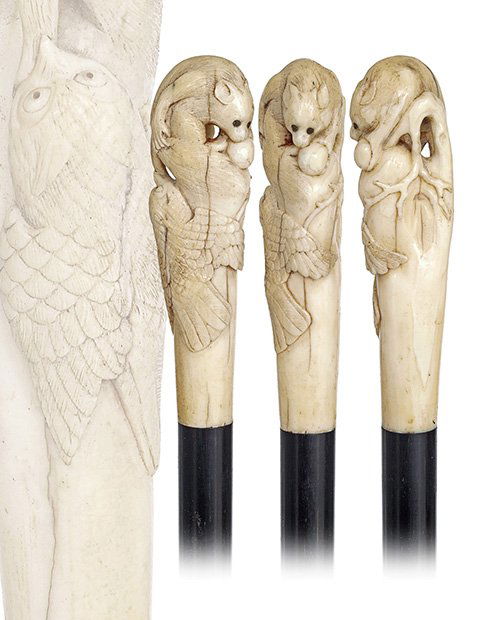 123. Asian Ivory Dress Cane-Ca. 1890-Carved ivory monke: 123. Asian Ivory Dress Cane-Ca. 1890-Carved ivory monkey and owl on a rock in the traditional Meiji-Japanese accurate detail, ebony shaft with a stag horn ferrule.-H. 4 ¼” x 1 ¼”, O.L. 37”-