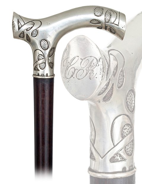 153. Art Nouveau Dress Cane-Ca. 1900-Large and well-pro: 153. Art Nouveau Dress Cane-Ca. 1900-Large and well-proportioned Silver Opera handle, rosewood shaft and a horn ferrule. Beautiful decoration, engraved initials “C.R.” and a full set of German hal