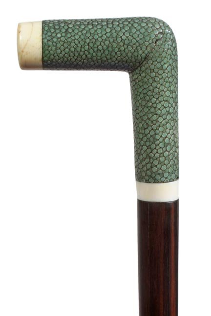 190. Shagreen/Ivory Dress Cane-Ca. 1925-A nice shark sk: 190. Shagreen/Ivory Dress Cane-Ca. 1925-A nice shark skin cover with ivory end caps, ivory type collar, exotic wood shaft and a metal ferrule-H. 3” x 2 ½”, O.L. 33”-