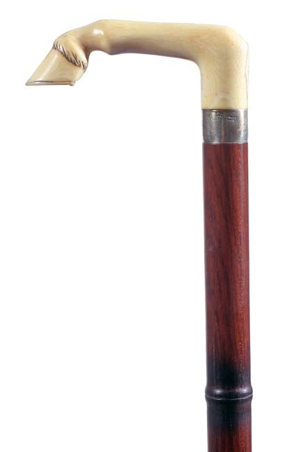 255. Ivory Horse Hoof Cane-Ca. 1920-A nicely carved han: 255. Ivory Horse Hoof Cane-Ca. 1920-A nicely carved handle, British hallmarked coin silver collar, exceptional faux bamboo hardwood shaft and a horn ferrule-H. 3 ½” x 1 ½”, O.l. 34 ½”-