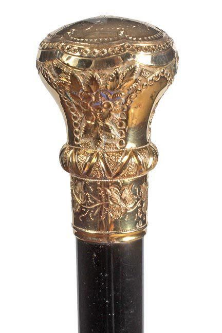 260. Gold-Filled Dress Cane-Dated 1887-A very nice Simm: 260. Gold-Filled Dress Cane-Dated 1887-A very nice Simmons Presentation cane in exceptional condition, fine ebony shaft and a metal ferrule-H. 1 ¾” x 2 5/8”, O.L. 36”-