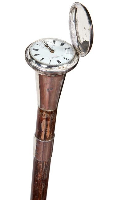 54. Falconer Silver Watch Cane-Dated 1823-Both dial and: 54. Falconer Silver Watch Cane-Dated 1823-Both dial and coin silver case are dated, “G. Falconer Hong Kong and London”, hinged top on silver handle, British hallmarked silver collar, hardwood shaf