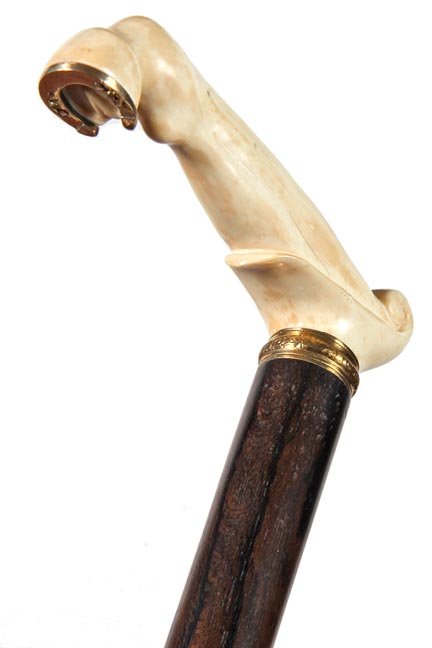 117. Gold and Ivory Horse Hoof Cane-Ca. 1900-A unique: 117. Gold and Ivory Horse Hoof Cane-Ca. 1900-A unique presentation of this subject matter which also has a gold horseshoe attached, ornate gold collar, rich mahogany shaft and an ivory ferrule-H. 4 ½