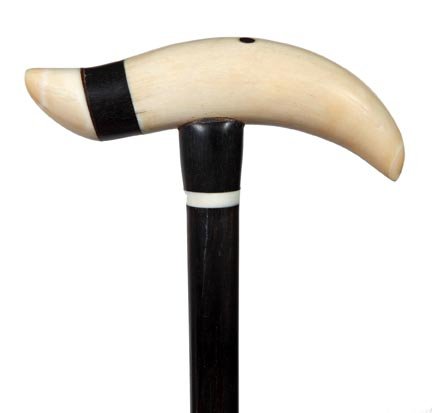 122. Scrimshaw Ivory Cane-Ca. 1875-A nice whale’s tooth: 122. Scrimshaw Ivory Cane-Ca. 1875-A nice whale’s tooth handle with a baleen spacer which has a point of another tooth as an end cap, small ivory collar, thick ebony shaft and a stag horn ferrule-H.