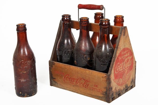 Brown Knoxville Coca-Cola bottles and carrying case: Brown Knoxville Coca-Cola bottles and carrying case