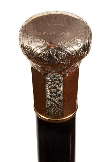 63. Masonic Gold Dress Cane-Dated 1872-A presentation: 63. Masonic Gold Dress Cane-Dated 1872-A presentation gold-filled handle from Masonic Lodge No. 69, ornate high relief panels on the side, small gold-filled collar, ebony shaft and a metal ferrule-H.