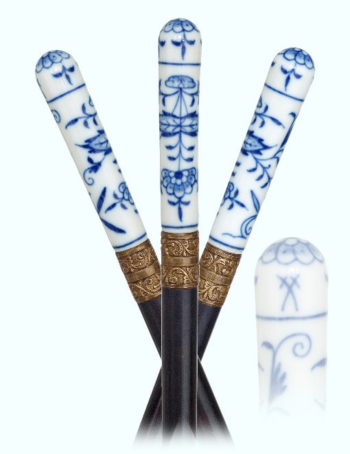 91. Meissen Porcelain cane-Ca. 1900-Straight white: 91. Meissen Porcelain cane-Ca. 1900-Straight white porcelain handle decorated in cobalt blue with the classic, “Zwiebelmuster” onion pattern, ebony shaft with a metal collar and an ivory ferrule.