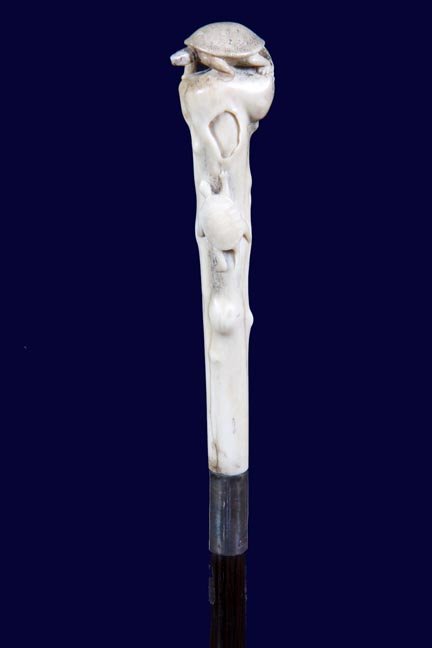195. Japanese Stag Cane-Ca. 1900-A carved stag handle: 195. Japanese Stag Cane-Ca. 1900-A carved stag handle with two turtles and twig spurs, signed sterling collar, exotic wood shaft and a horn ferrule-H. 6 ½” x 1 ½”, O.L. 36”-