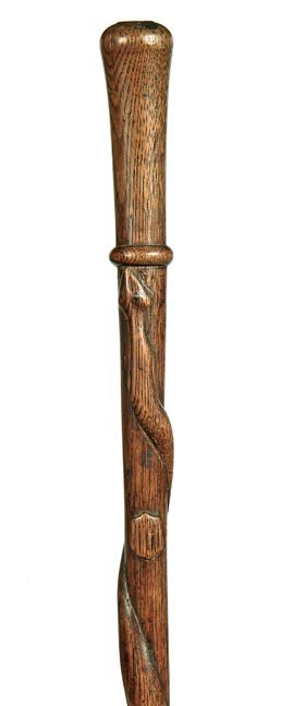 170. Folk Art Snake Cane-Ca. 1890-A one piece carved: 170. Folk Art Snake Cane-Ca. 1890-A one piece carved oak shaft with a full length snake, federal shield, and a brass ferrule-O.L. 33”- 150-250