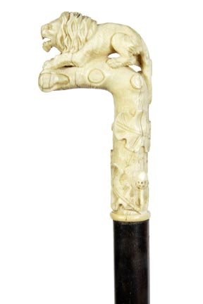 154. Ivory Lion Dress Cane-Ca. 1875-A unique carved: 154. Ivory Lion Dress Cane-Ca. 1875-A unique carved ivory handle, small ivory collar, ebony shaft and a horn ferrule-H. 2” x 3 ½”, O.L. 36”