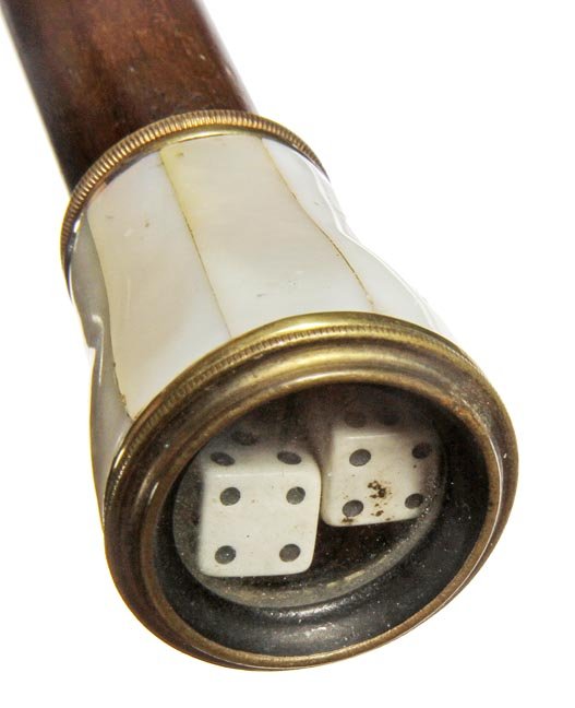 156. Gambler’s “Craps” Cane-Ca. 1930-A mother of pearl: 156. Gambler’s “Craps” Cane-Ca. 1930-A mother of pearl and brass handle which holds two die under glass, exotic hardwood shaft and a metal ferrule-H. 1 ¾” x 1 ½”, O.L. 35 ½”