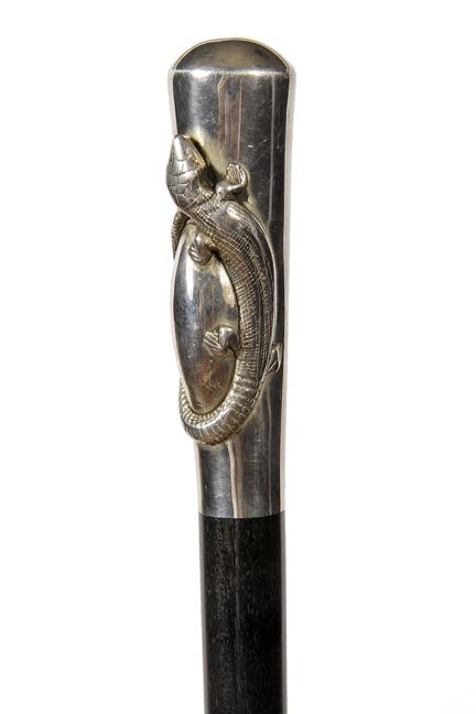 192. Sterling Lizard Dress Cane-Ca. 1925-A heavy cast: 192. Sterling Lizard Dress Cane-Ca. 1925-A heavy cast signed sterling handle with a full length lizard, thick and heavy ebony shaft and a metal ferrule-H. 4 ½” x 1 ½”, O.L. 36”