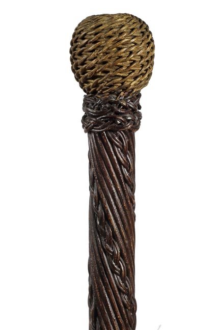 131. Nautical Woven Sailor’s Cane- Ca. 1880-A large: 131. Nautical Woven Sailor’s Cane- Ca. 1880-A large woven and knotted sailor’s cane with original patina and very well done and a metal ferrule. O.L.-36”