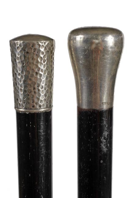 137. Silver Dress Canes- Ca. 1910-A pair of signed: 137. Silver Dress Canes- Ca. 1910-A pair of signed sterling silver dress canes both with ebony shafts and horn ferrules. Longest 36”