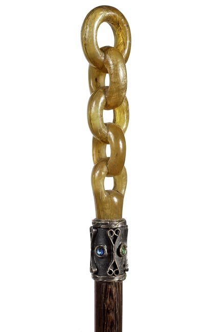 162. Bone Chain Dress Cane – Ca. 1900- a one piece: 162. Bone Chain Dress Cane – Ca. 1900- a one piece cared bone handle in the form of a chain (could be Odd Fellows),ornate silver metal collar with four different colored stones, hardwood shaft and