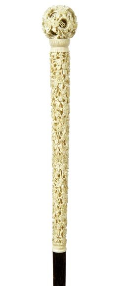 223. Ivory Mystery Ball Cane- Ca. 1890- An intricately: 223. Ivory Mystery Ball Cane- Ca. 1890- An intricately carved Asian handle with balls within balls, probably the best we have seen, exotic wood shaft and a metal ferrule. H. 9” x 1.5”, O.L.- 36”