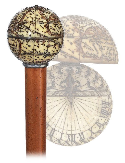 35. Ivory Globe and Sundial Cane-19th Century-Ivory: 35. Ivory Globe and Sundial Cane-19th Century-Ivory terrestrial globe cane accurately carved in scrimshaw technique with the continents and the oceans and their related appellations. The globe is hing