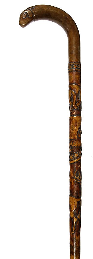 Folk Art Cane- Circa 1900-One piece carved with a pair: Folk Art Cane- Circa 1900-One piece carved with a pair of horses, bald eagle above stars, standing elk, hardwood shaft and no ferrule, O.L. 33"