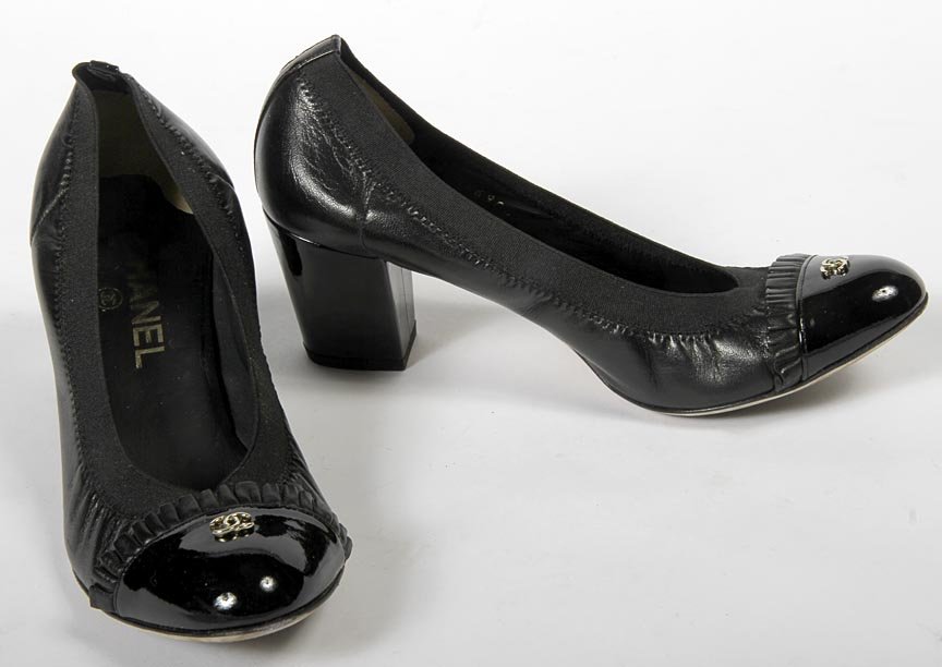 Chanel-Black leather heels with elastic, patent leather: Chanel-Black leather heels with elastic, patent leather toe and gold logo. Size 37 1/2