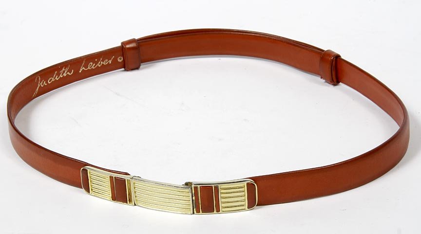 Judith Leiber-Adjustable red leather belt with gold: Judith Leiber-Adjustable red leather belt with gold buckle. Adjustable up to 36".