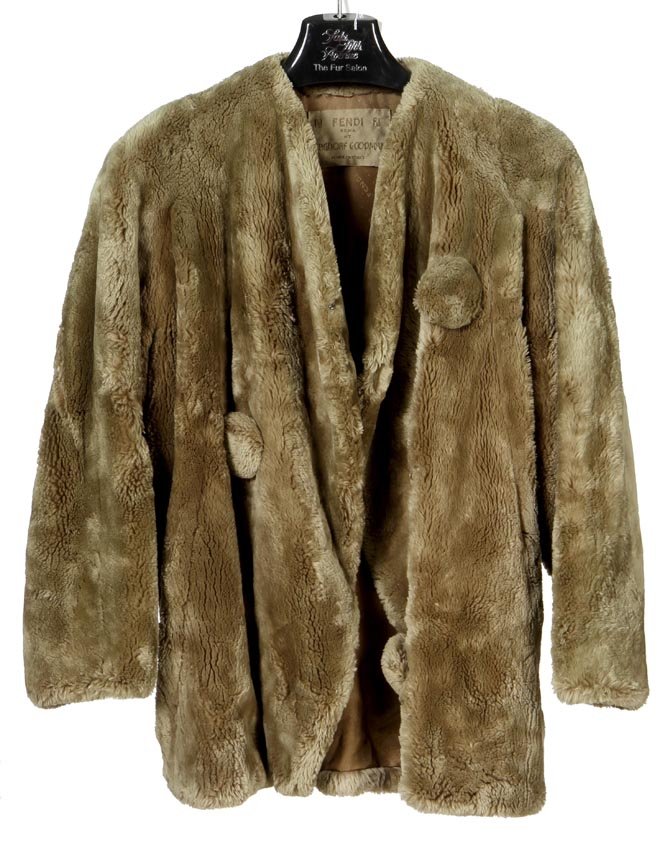 Fendi at Bergdorf's- Beaver fur, silk lined waste coat: Fendi at Bergdorf's- Beaver fur, silk lined waste coat with large pompom style decorative balls and frog enclosuresIt appears to be a 6 but not marked