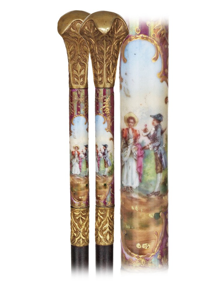 31. Porcelain Indoor Cane-Circa 1890-Long cylindrical: 31. Porcelain Indoor Cane-Circa 1890-Long cylindrical porcelain handle finely painted with a gallant scene framed by rich gold moriage on a pale purple background. The porcelain part is complimented w