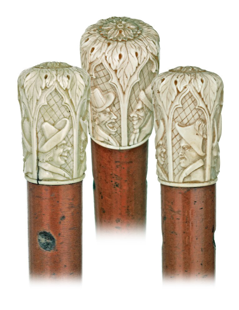 121. Ivory Revival Cane-First half of the 19th: 121. Ivory Revival Cane-First half of the 19th Century-Fairly large ivory knob carved with individual character portraits of four men and the one of a donkey all in identical Gothic and framing arcade