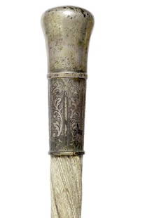 1. Important Narwhal Cane-Ca. 1820-A massive silver: 1. Important Narwhal Cane-Ca. 1820-A massive silver metal handle with florentine engraving, an important large handle, full narwhal shaft with no ferrule-H. 2 ½” x 6 ½”, Diameter of shaft 1