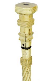 10. Architectural Whalebone Cane-Ca. 1840-A triple: 10. Architectural Whalebone Cane-Ca. 1840-A triple carved whale’s tooth handle with a Federal coin silver shield atop, baleen spacer, 7/8” whalebone shaft which is 85% carved (two secured cracks