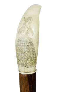 16. Scrimshaw Whale’s Tooth Cane-Ca. 1865-A whale’s: 16. Scrimshaw Whale’s Tooth Cane-Ca. 1865-A whale’s tooth handle which is probably British with a young lady and a queen figure carved in the handle, oval walnut shaft and a horn ferrule-H. 4”