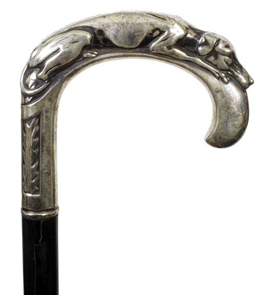 40. Art Deco Silver Dress Cane-Ca. 1920-A stylized: 40. Art Deco Silver Dress Cane-Ca. 1920-A stylized signed 900 silver dog crutch handle, small silver collar, ebony shaft and a horn ferrule-H. 4 ½” x 4”, O.L. 31”