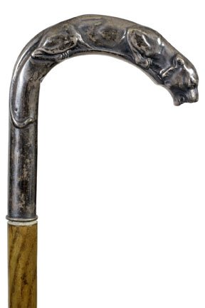 46. Panther Dress Cane-Ca. 1910-A stylized silver: 46. Panther Dress Cane-Ca. 1910-A stylized silver panther handle with unreadable hallmarks, exotic hardwood shaft and a metal ferrule-H. 5” x 4 ½”, O.L. 35”