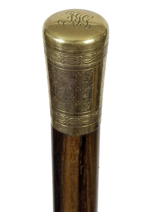 55. Tiffany & Co. Dress Cane-Early 20th Century-An: 55. Tiffany & Co. Dress Cane-Early 20th Century-An ornate signed Tiffany 18kt gold handle which unscrews from the exotic wood shaft and a horn ferrule-H. 2” x 1”, O.L. 35 ½”