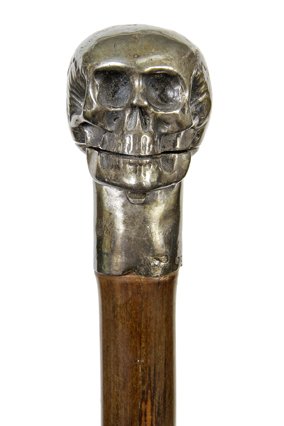 61. Skull Poison Cane-19th Century-A hinged silver: 61. Skull Poison Cane-19th Century-A hinged silver metal skull with British hallmarks, upper section of skull that’s hinged with a pushbutton below the jaw and when opened there is a glass vial with